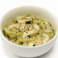 Sunomono (Cucumbers) · Refreshing, lightly pickled cucumbers, garnished with sesame seeds.