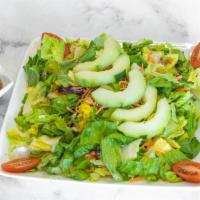 Small Garden Salad · Crisp salad with romaine lettuce, red cabbage, julienned carrots, sliced cucumbers and grape...