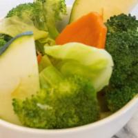 Steamed Veggies · A medley of cabbage, zucchini, broccoli, & carrots.