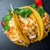 Chicken Taco · Our delicious hard shell, chicken taco with lettuce and cheese.