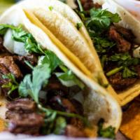 Carne Asada Taco · Mouthwatering steak taco with fresh guacamole and pico.