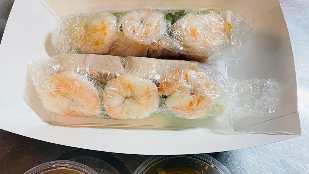 Pork & Shrimp Spring Rolls · (2 Rolls). Toasted Rice Pork Belly, Shrimp, Lettuce, Bean Sprouts, Carrots, Cucumber, and Vermicelli Noodles wrapped in Rice Paper. Served with Fish Sauce