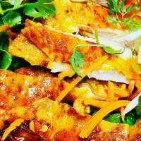 Spicy Curry Thigh Salad · crispy curry chicken over lettuce , cucumber, carrots, beansprouts, cilantro,  and cherry to...