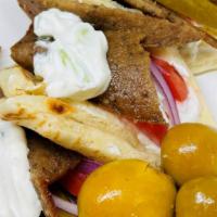 Gyro Bites Plate · Lamb and Beef Gyro, Cucumber, Garlic Yogurt, Red Onions, Tomatoes, Pickles, and Turnip with ...