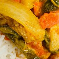 Chicken Curry · Chicken Curry served with White Rice