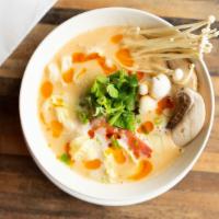 Tom Yum Kha Mushroom · Gluten free. Creamy coconut soup with lemongrass galangal, kaffir lime leaf, onion, tomatoes...