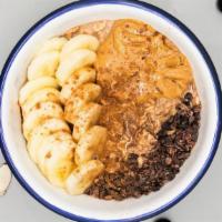 Peanut Butter Cacao Oatmeal · 100% organic peanut butter cacao oatmeal made with rolled oats, house cashew milk, cacao pow...