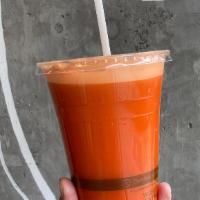 Left Coast Juice · 100% organic juice made with orange, ginger, lemon, golden beet & carrots