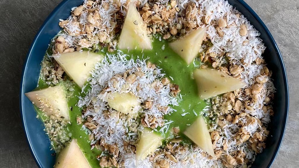Switchback Smoothie Bowl · 100% organic smoothie bowl made with kale, pineapple, banana, house cashew milk topped with granola, chia seeds, coconut shreds & pineapple slices