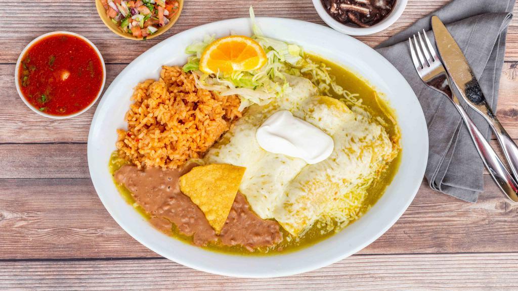 Enchiladas Verdez · Three soft tortillas stuffed with your choice of beef, chicken, or cheese topped with green sauce, melted cheese, and sour cream.