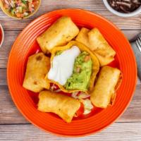Mini Chimichangas · Mini deep-fried burritos with a choice of beef or chicken served with guacamole and sour cre...