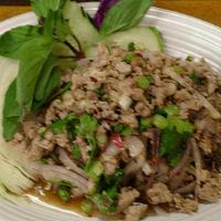 * Larb Gai · Ground chicken breast tossed with lime chili pepper vinaigrette, sweet basil, mint & cilantr...