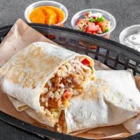 Classic Burrito · Your choice of protein wrapped up in a flour tortilla with rice, beans, fresh shredded monte...