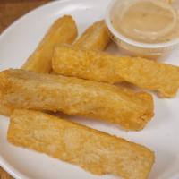 Yuca Fries · Crispy and Delicious with Mojo Sauce