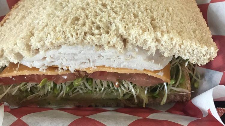 Cool Hand Cuke · Vegetarian. Smashed avocado, cucumber, lettuce, or sprouts, tomato, cheddar, Italian dressing on whole wheat.