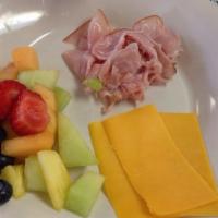 Lunchable Plate · Choice of one meat, choice of one cheese, strawberries, blueberries, crackers, pickle spear.