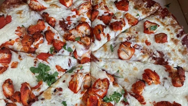 Chicken Tikka Pizza · Chicken tikka. Add extra toppings for an additional charge.