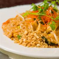 Pad Thai · Rice noodles sautéed with tofu, egg, green onions, bean sprouts and crushed peanuts in Thai ...