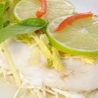  Lemon Orange Raughy · Steamed orange raughy with bell peppers, cabbage, green onions, mint and ginger in our light...