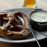Pretzel Fondue · Original Swiss Cheese fondue with two Bavarian pretzels
