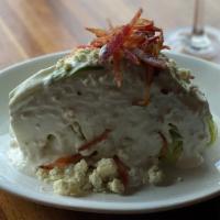 Bleu Wedge Salad · Crisp iceberg wedge smothered with our scratch made blue cheese dressing, topped with crispy...