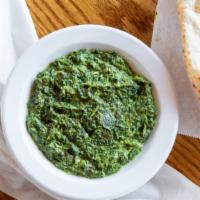 Saag Dip · Delicious Indian creamed spinach with fresh garlic, cumin, & ginger. Served with Naan bread ...