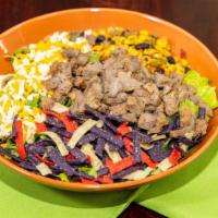 Santa Fe Salad · Grilled steak, romaine lettuce, tomato, cheddar cheese, corn, black beans, pico de gallo, to...