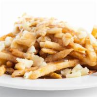 Poutine · French fries | Wisconsin cheese curds | brown gravy.