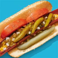 Vegan Chicago Dog · A true Chicago favorite. Vegan dog topped with yellow mustard, raw onions, sweet relish, Rom...