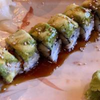 Caterpillar Roll (8) · Inside - cucumber, carrot, freshwater eel. On top - avocado with eel sauce and sesame seeds.