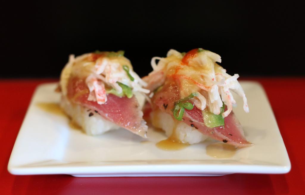 Olo Nigiri-Sushi · Seared tuna, crab, avocado, green onion, sweet sauce.