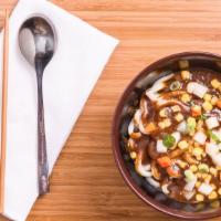 Curry Udon · Udon noodles topped with Japanese curry and corn, diced carrots and potatoes.