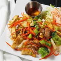Tofu 'N Veggies Rice Platter · Tofu and vegetables stir fry, vegetables - broccoli, carrots, mushrooms, cabbages. Served wi...