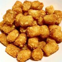 Tater Tots · Our Famous Crispy Tater Tots Seasoned With Our House Mix. *Gluten Free