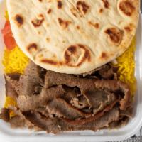 Gyros Plate · Marinated chicken breast charbroiled, served with rice salad , pita bread, tomatoes, onions ...