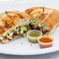 Torta · Mexican sandwich served in a grilled to crispy.mexican bolillo(french bread roll) stuffed wi...