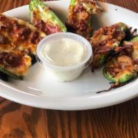 Jalapeno Poppers · jalapeno peppers stuffed with goat cheese, mozzarella, fresh garlic and prosciutto