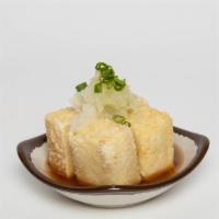 Agedashi Tofu · Deep-fried tofu with radish, green onion, tempura sauce. Vegetarian.