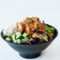 Salmon Poke Bowl · Poke Salmon, Cucumber, Spicy Squid Salad, Seaweed Salad, Crab Salad, Sushi Rice, Spring Mix,...