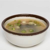 Miso Soup · Served with tofu, scallions, and wakame.