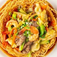 Mi Xao Gion Dac Biet · Crispy fried noodle with beef, chicken and shrimp.