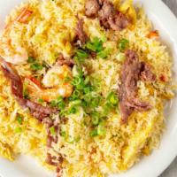Fried Rice Combination  · chicken, shrimps and beef