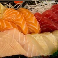 Sashimi Regular (12 Pieces) · Assorted fresh fish sashimi.
