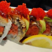 Spicy Dragon (8 Pieces) · Spicy tuna mixed with tempura crunch topped with broiled eel avocado tobiko and eel sauce.