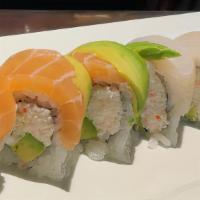 Rainbow · Eight pieces crab stick avocado and cucumber wrapped in seaweed, topped with tuna, salmon, r...