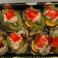 Around The World (7 Pieces) · Lobster, snow crab, shrimp, green onion, avocado, tobiko wrapped in seaweed, and fried tempu...