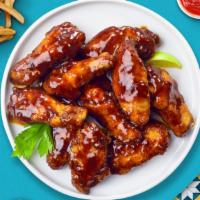 Bring Out The Bbq Wings  · Fresh chicken wings breaded, fried until golden brown, and tossed in barbecue sauce. Served ...