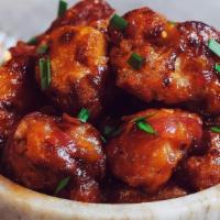 Gobi Manchurian · Indo-Chinese delight. Cut cauliflower pieces, battered, fried, and sauteed over sweet, spice...