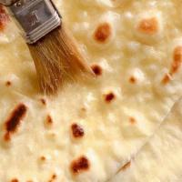 Butter Naan · naan bread coated with thin layer of butter