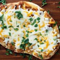 Cheese Naan · naan cooked with shredded cheese on top